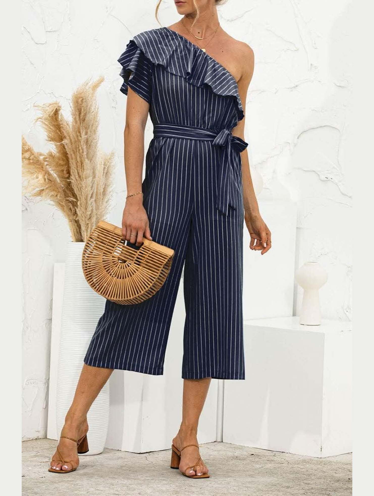 SLANTED SHOULDER RUFFLED STRIPED JUMPSUIT - Doublju