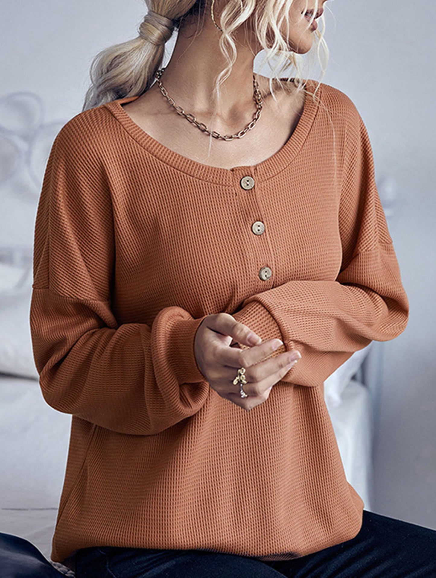 Long-sleeved base layer button-down sweater