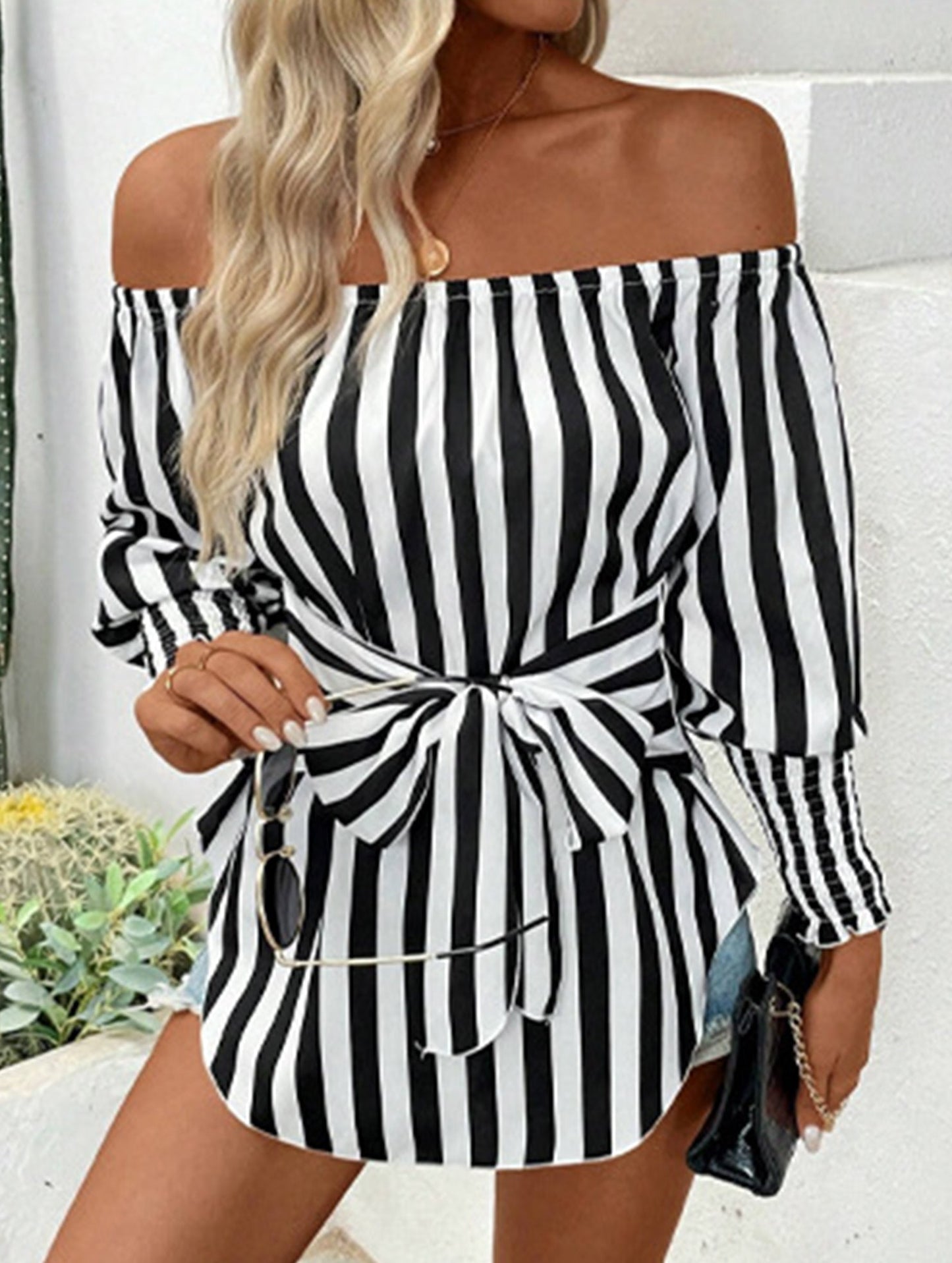 Loose off-the-shoulder asymmetrical striped shirt