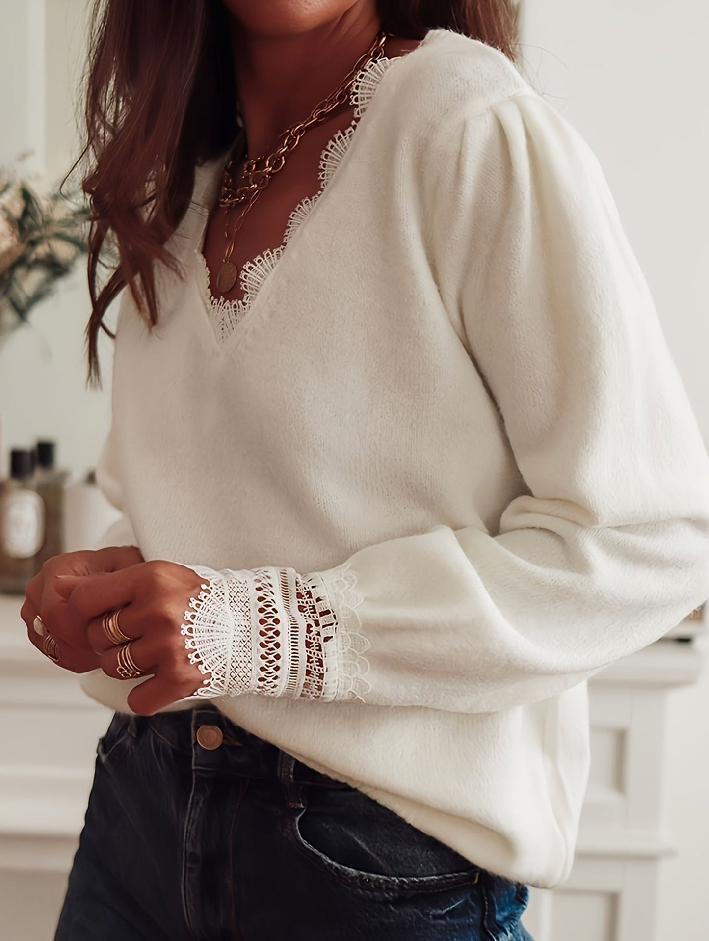 Solid color knitted hollow long-sleeved top