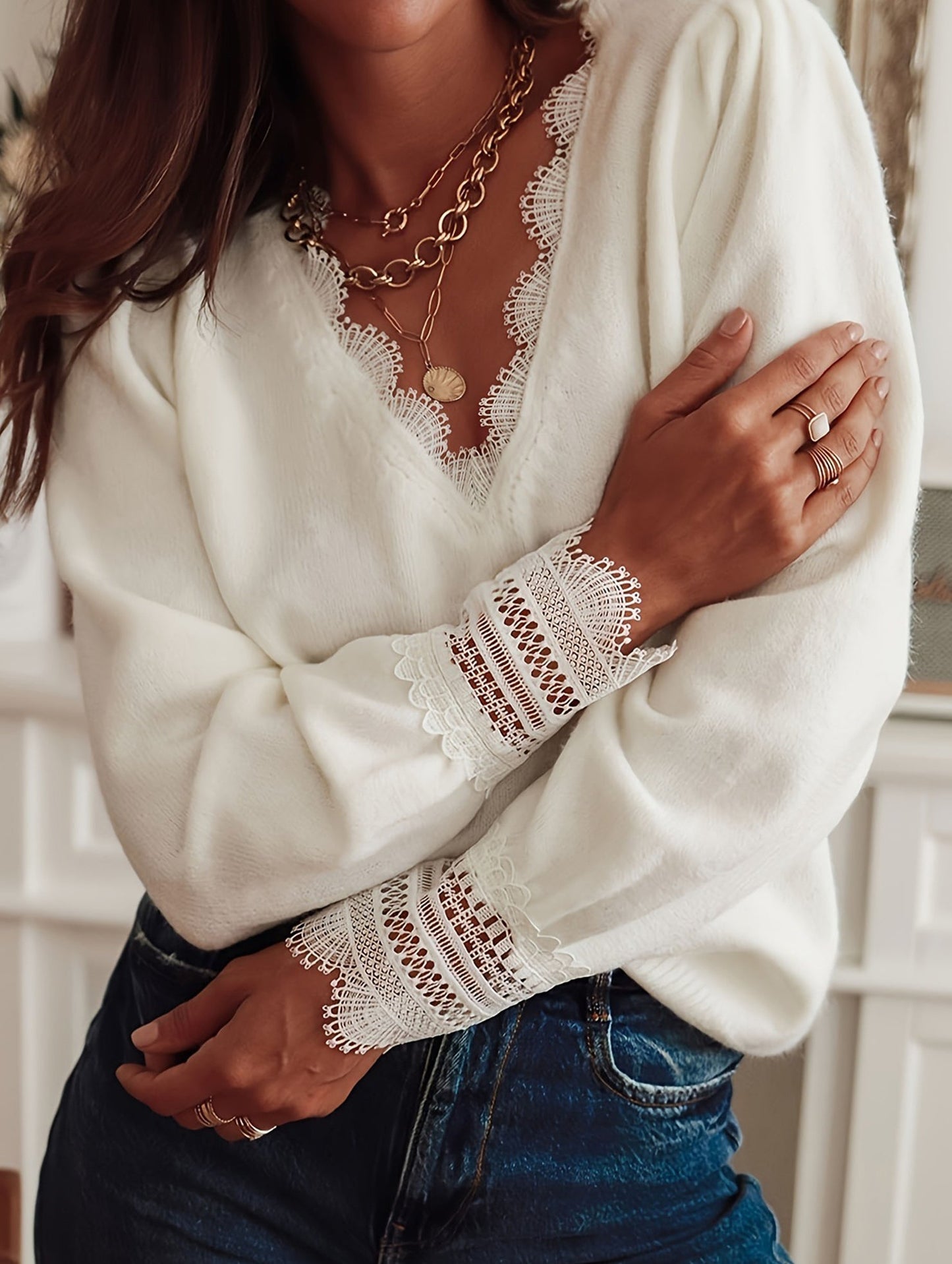 Solid color knitted hollow long-sleeved top