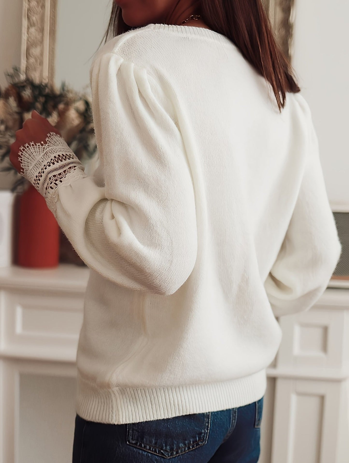 Solid color knitted hollow long-sleeved top