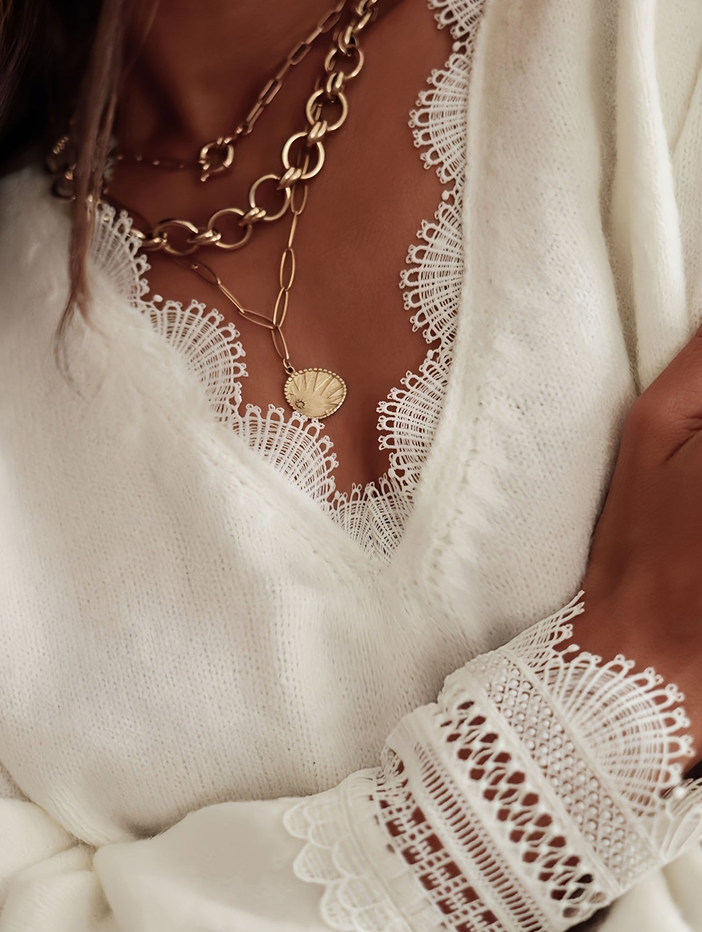 Solid color knitted hollow long-sleeved top