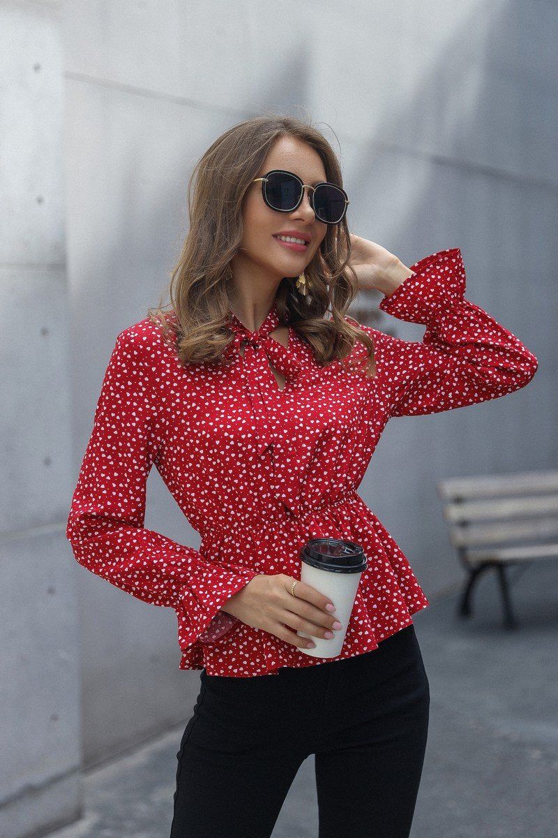 LANTERN SLEEVE TIED NECK HEART PATTERN TUNIC TOP
100% POLYESTER
SIZE S-M-L
MADE IN CHINA