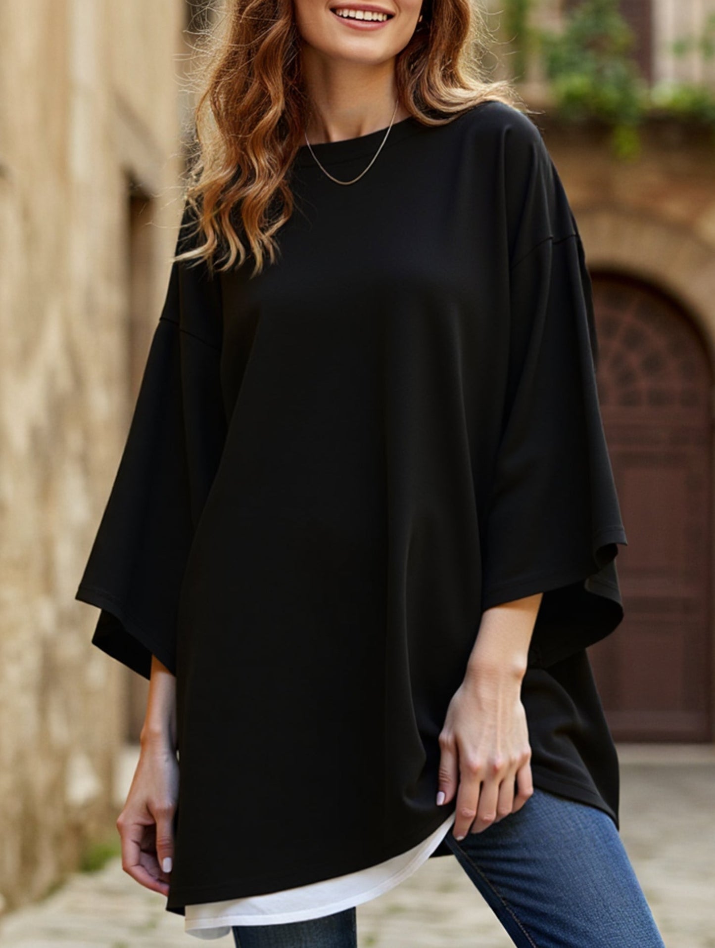 Solid color round neck slit long sleeve loose top