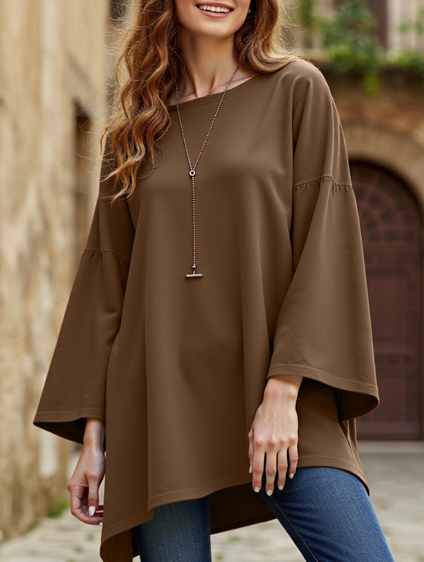 Solid color round neck slit long sleeve loose top