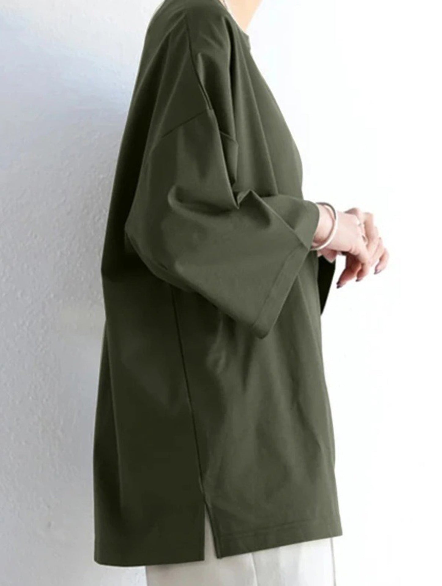 Solid color round neck slit long sleeve loose top