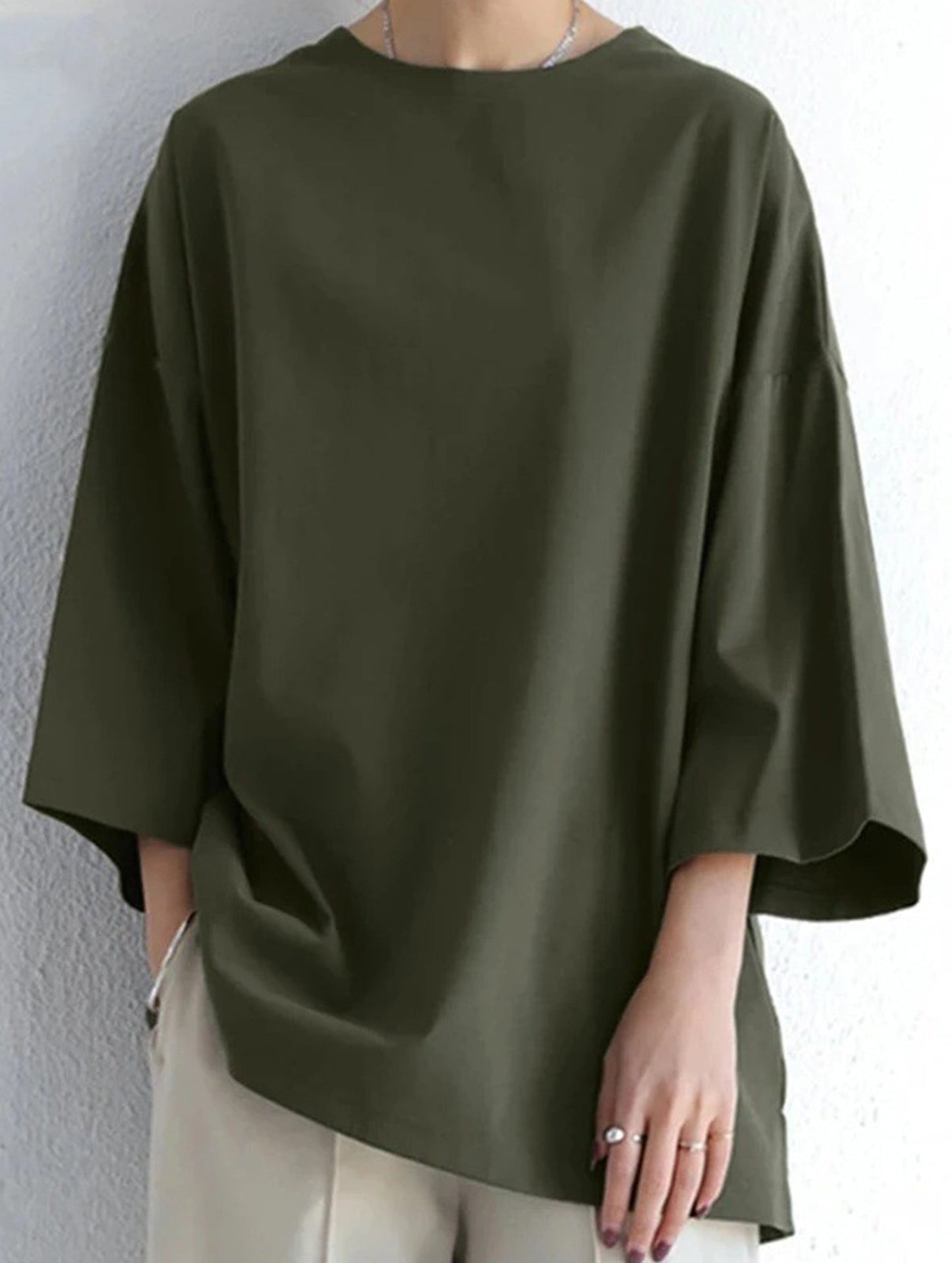 Solid color round neck slit long sleeve loose top