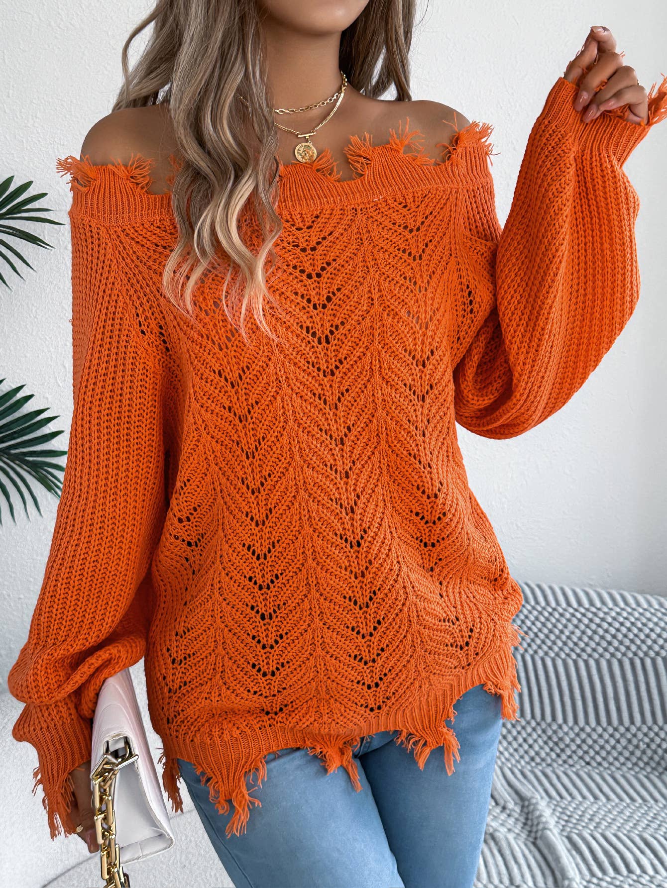 Solid-color cut-out off-the-shoulder sweater