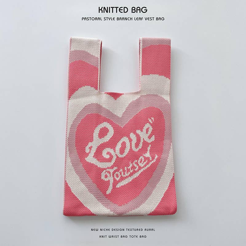 Heart-shaped color-blocked knitted handbag