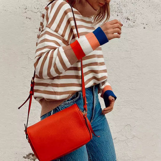 STRIPED TURTLENECK PULLOVER IN CONTRASTING COLORS