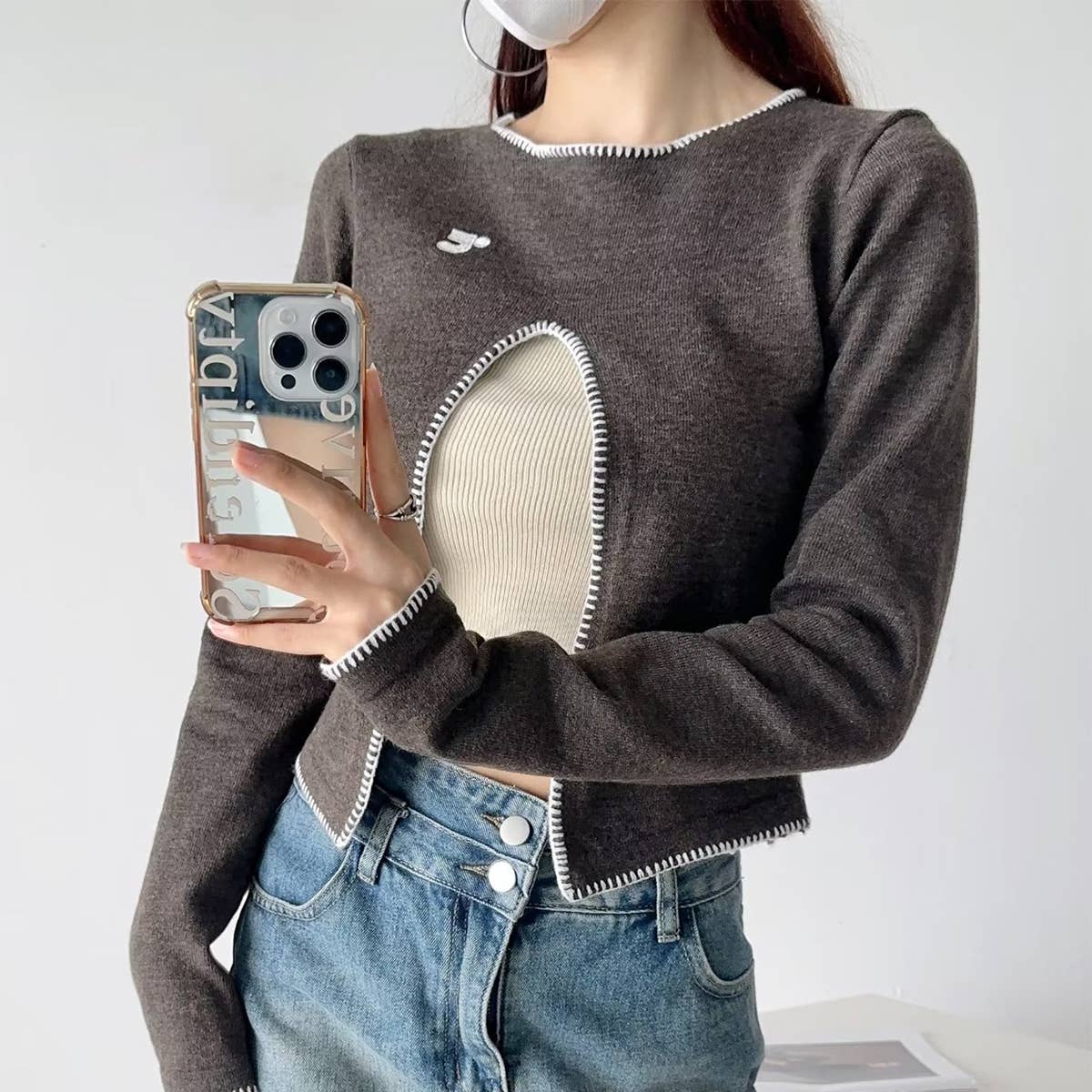 HOTTIE FOLDS IN A SLIM-FIT SHORT SWEATER