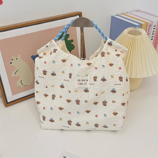 CWAB3909_CARTOON EMBOSSED CANVAS COMMUTER HANDBAG