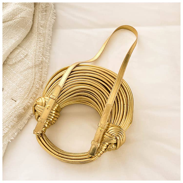 Metallic color striped appearance glossy handbag