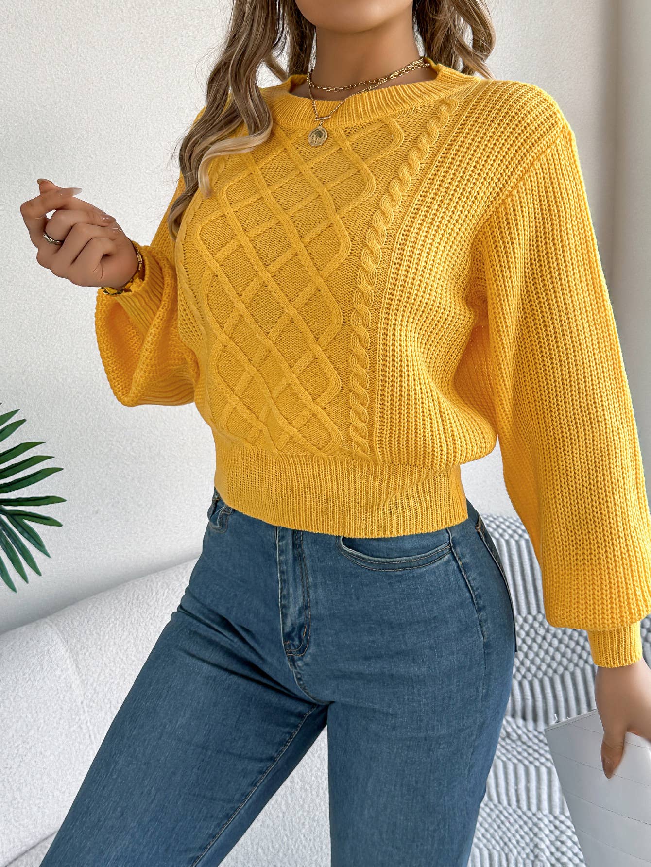 Lantern long-sleeved cinched-waist sweater
