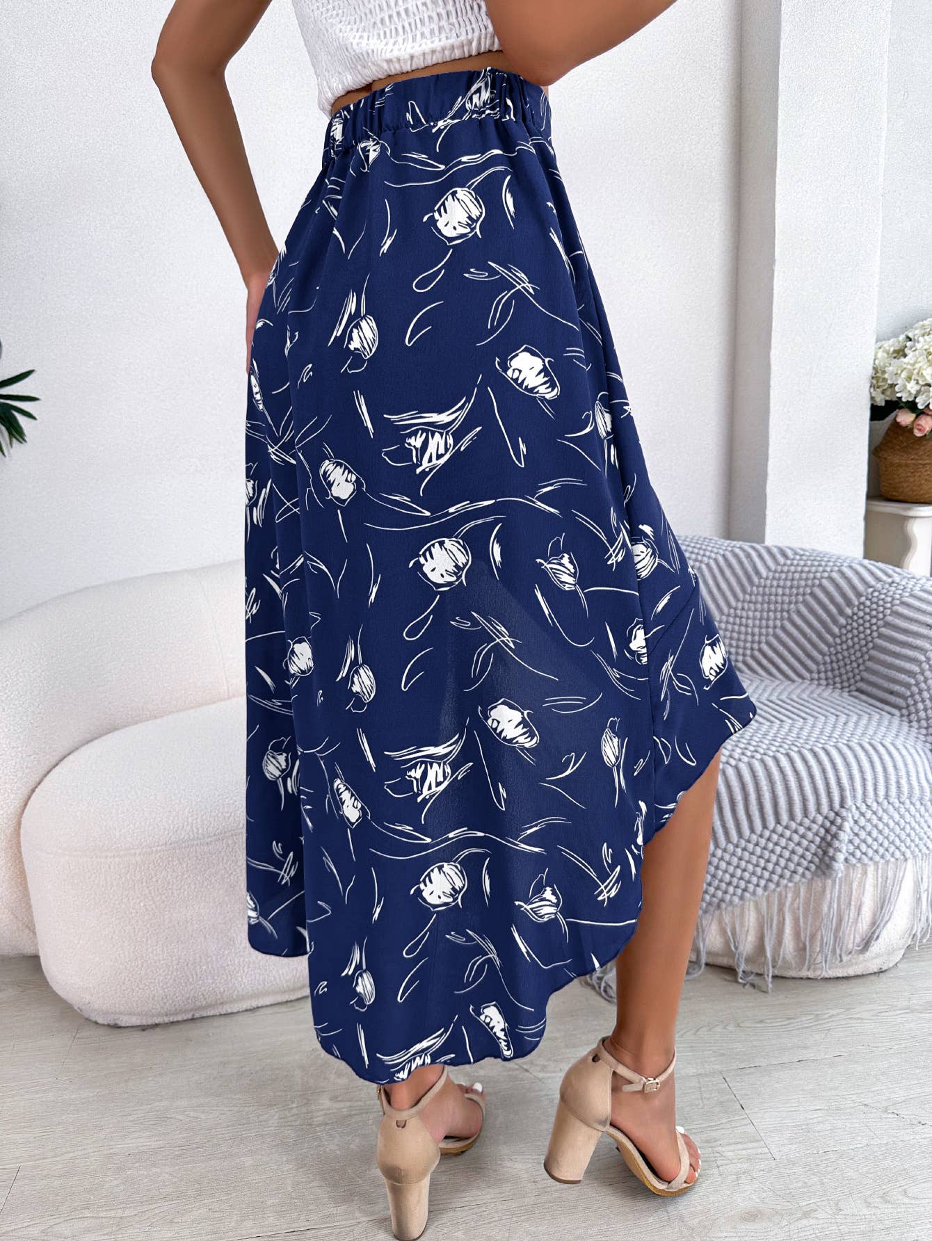 ASYMMETRICAL PEPLUM SKIRT