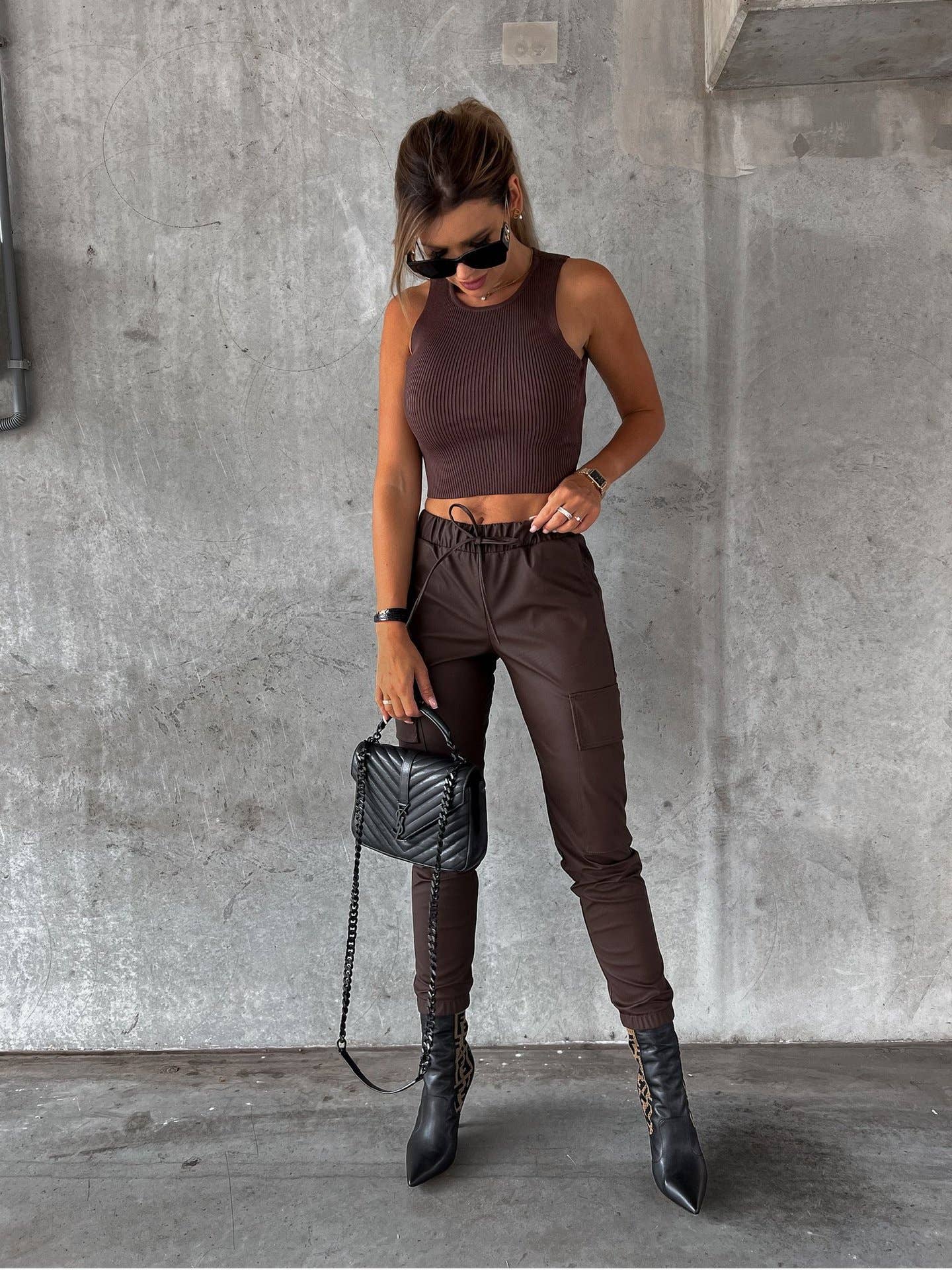 Waist-cinching street drawstring leather pants