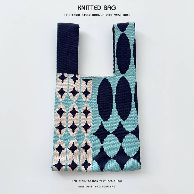 Heart-shaped color-blocked knitted handbag