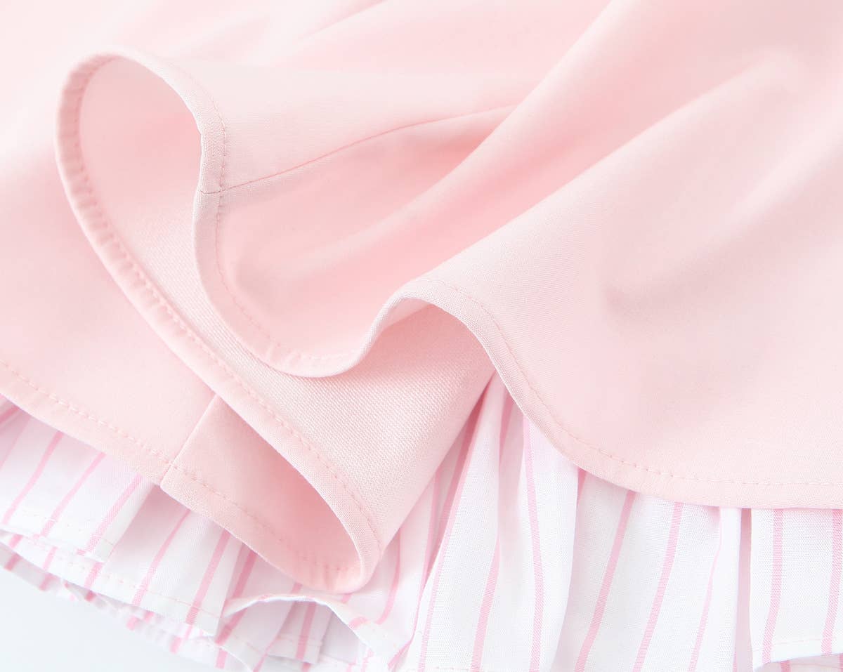 A short halter dress with striped patchwork