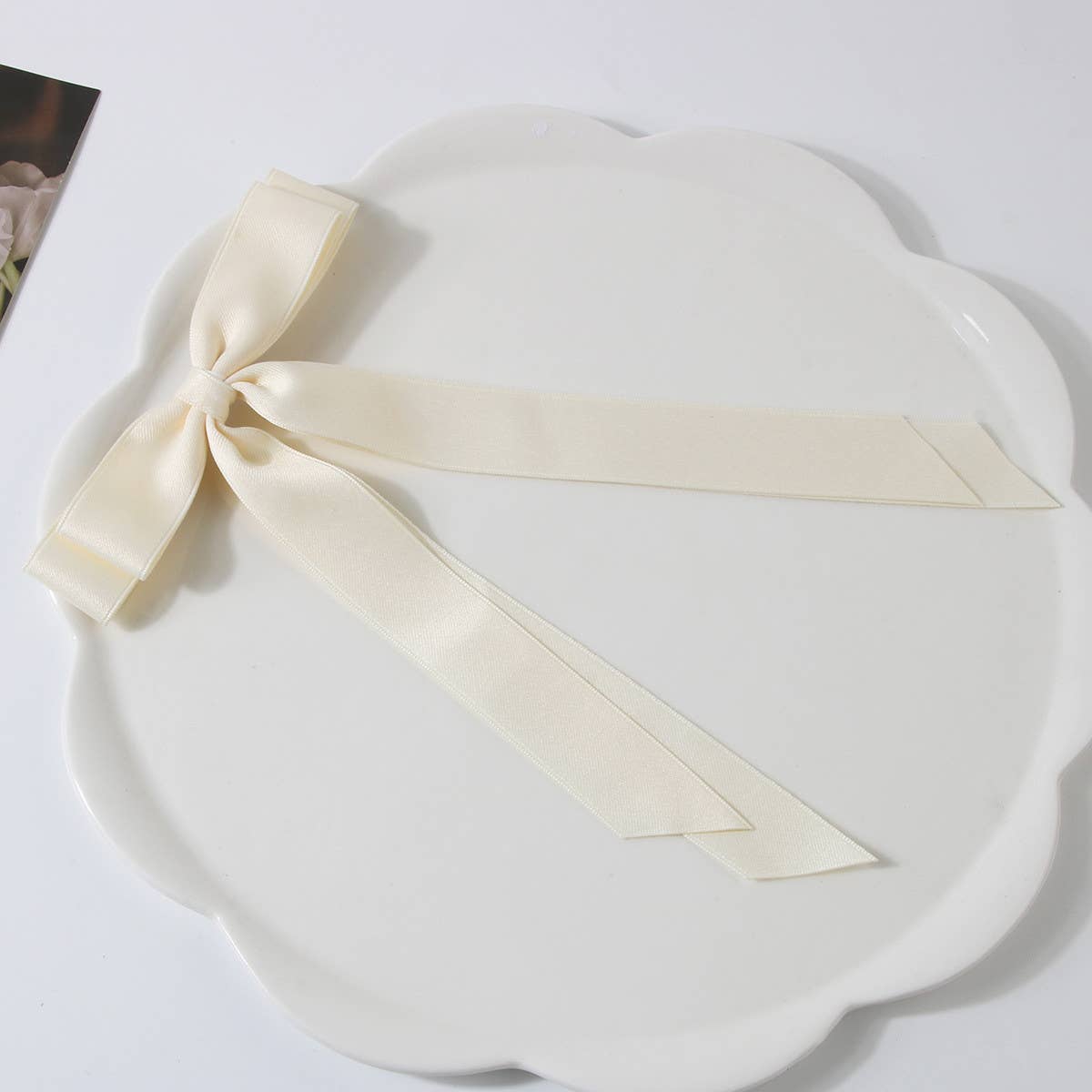 DOUBLE-LAYERED BOW HAIR CLIP_CWAHA1047