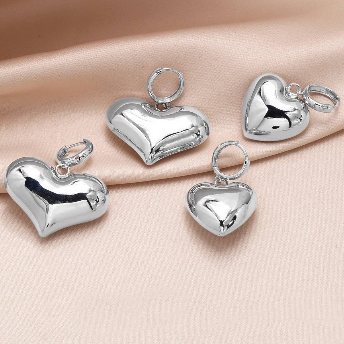 SILVER HEART-SHAPED PENDANT EARRINGS