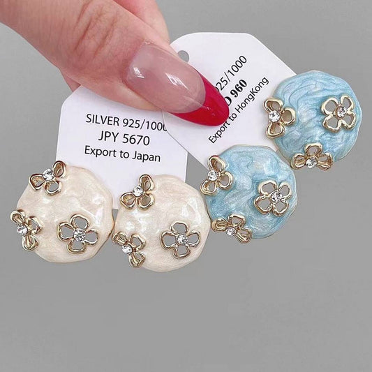 HOLLOW ZIRCON GEOMETRIC FLOWER EARRINGS