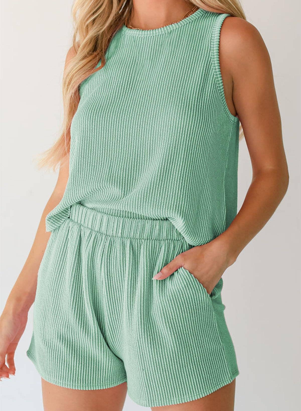 Twisted sleeveless vest, shorts and striped suit