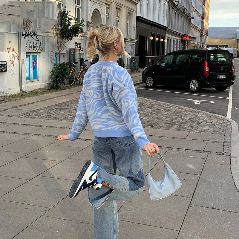 ANIMAL PRINT PULLOVER WITH LOOSE COLLAR