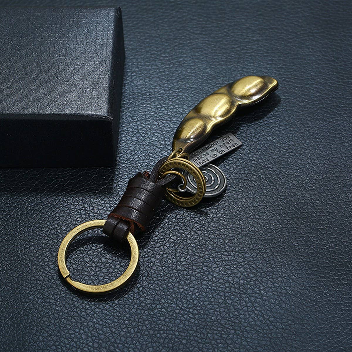 NEW HAND-WOVEN COWHIDE KEYCHAIN