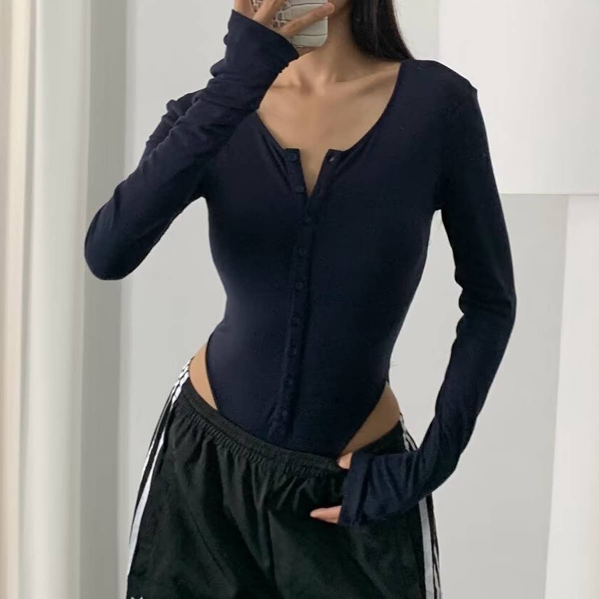 Round-neck single-breasted long-sleeved jumpsuit