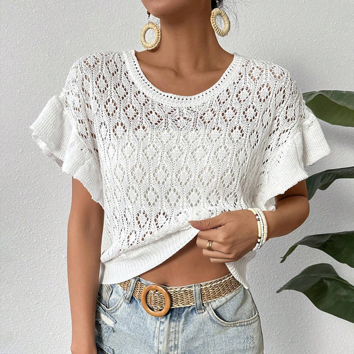 Round-neck hollowed-out ruffled knitted sweater