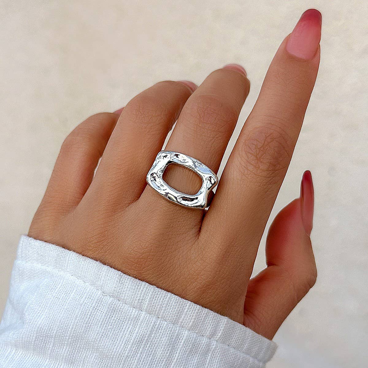SIMPLE ASYMMETRICAL STATEMENT FRENCH RING