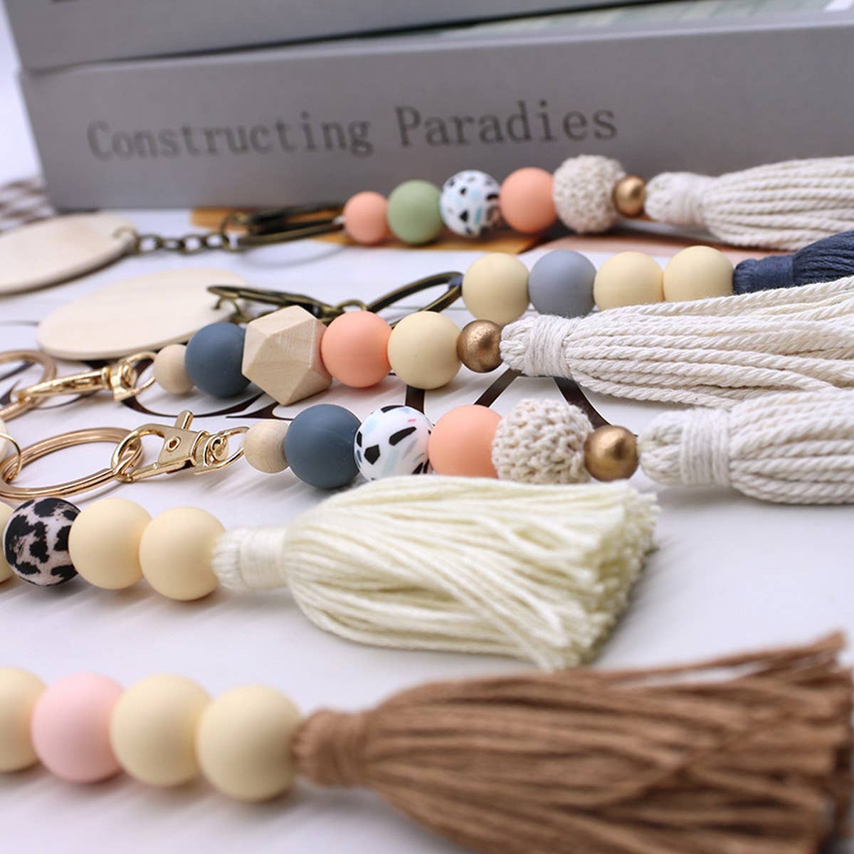 ROUND WOODEN BEADED TASSEL KEYCHAIN