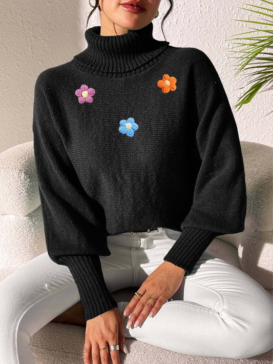 Simple hand-crocheted turtleneck sweater in a solid color