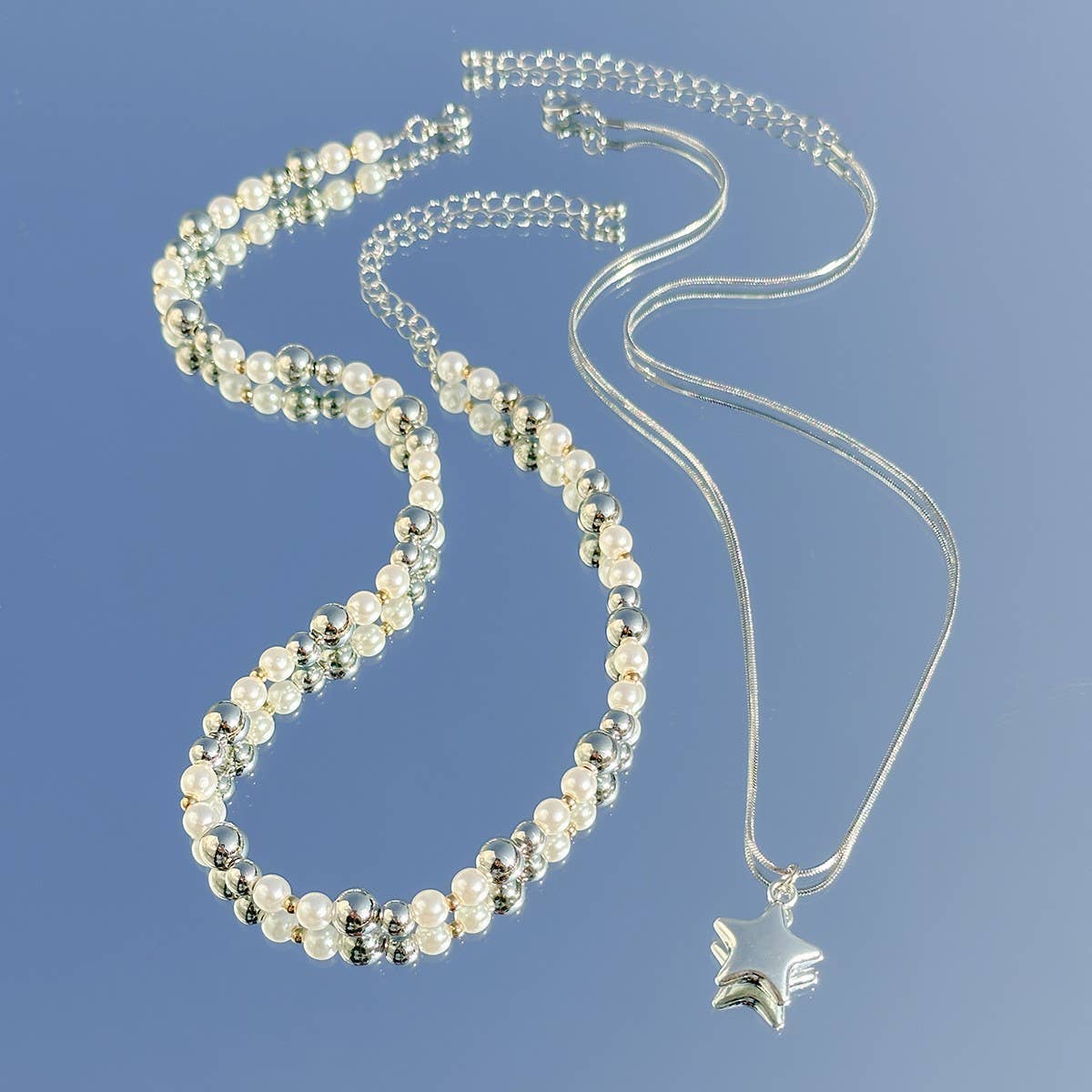 BEADED NECKLACE WITH STAR SHAPED PENDANT TASSELS_CWAJE1158