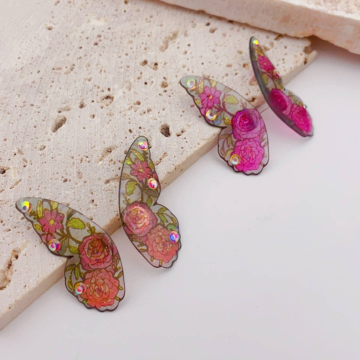 Painted ear studs with simulated butterfly wings
