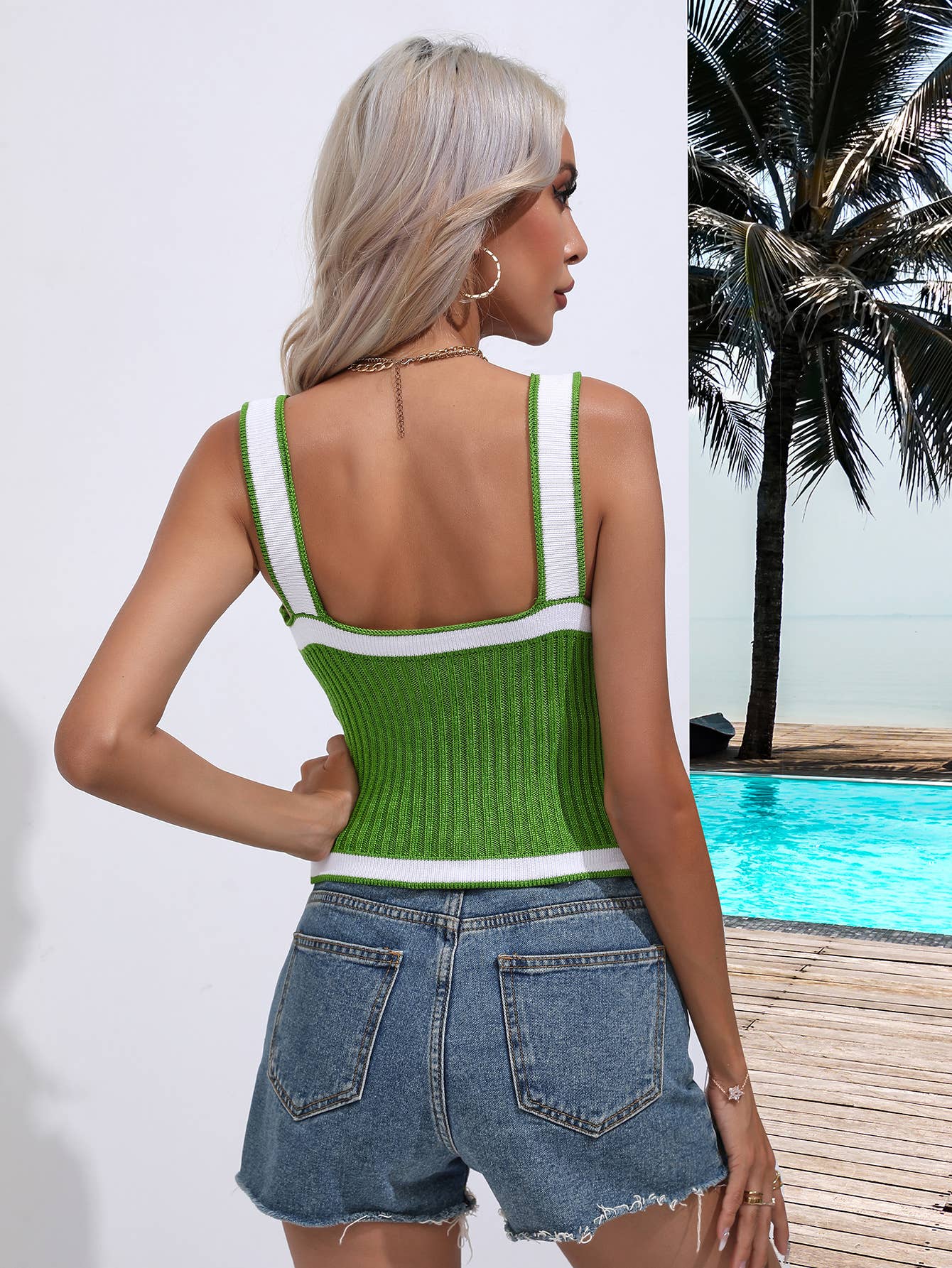 SLEEVELESS V-NECK SWEATER WITH CROSS HALTER