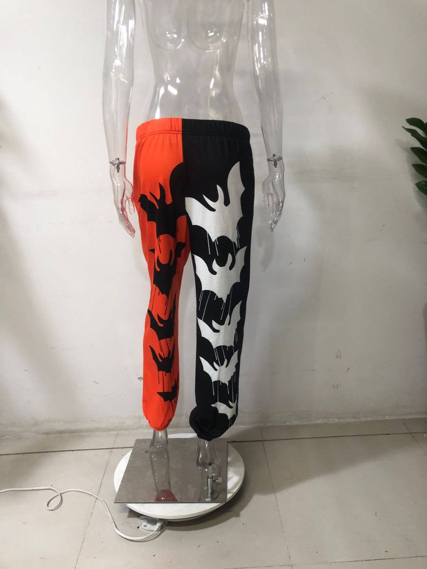 SPORTY BLACK AND ORANGE HARLAN STRAIGHT-LEG PANTS