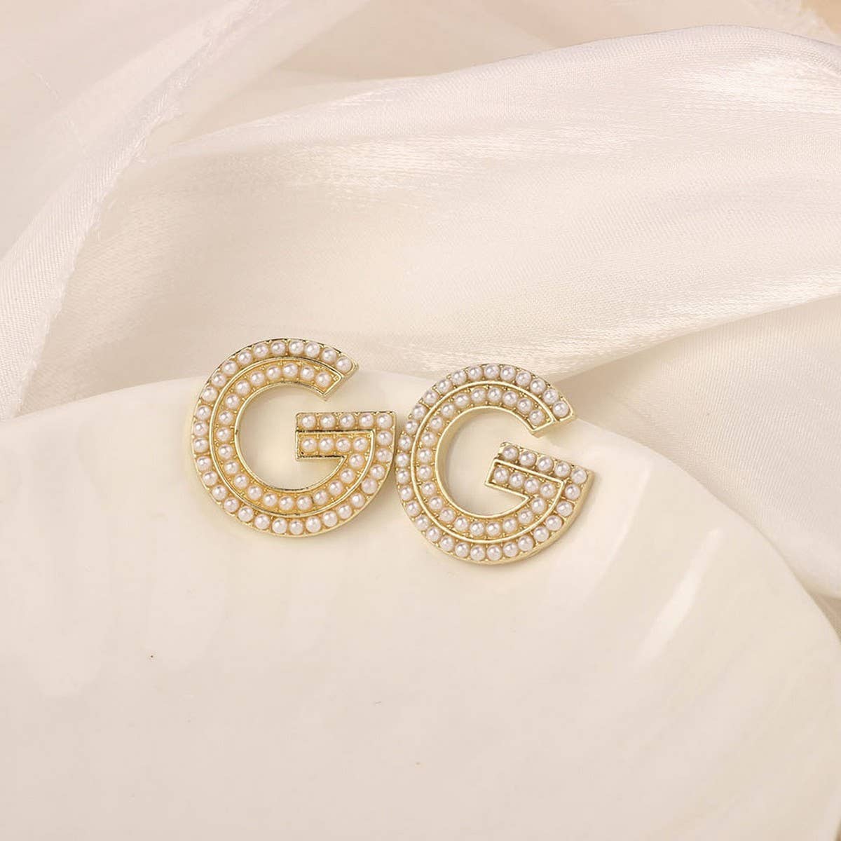 NEW SIMPLE HOLLOW FLOWER ENAMEL EARRINGS