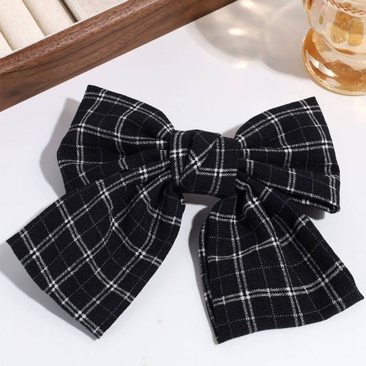 SIMPLE AND ELEGANT FLOWER DOT BOW CLIP