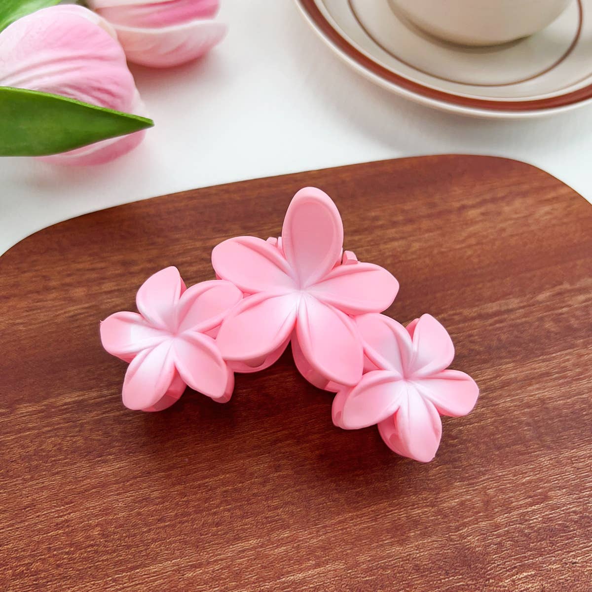 Candy-colored plastic hair clips with flowers