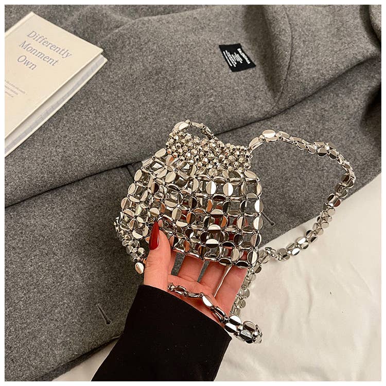 Fashionable hollowed-out glossy crossbody bag