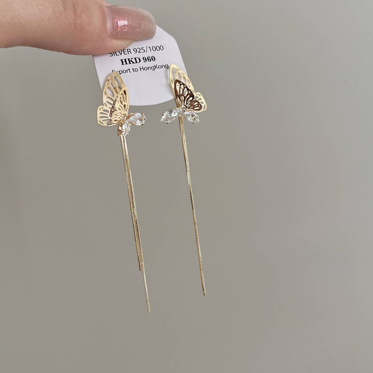 HOLLOW BUTTERFLY TASSEL EARRINGS