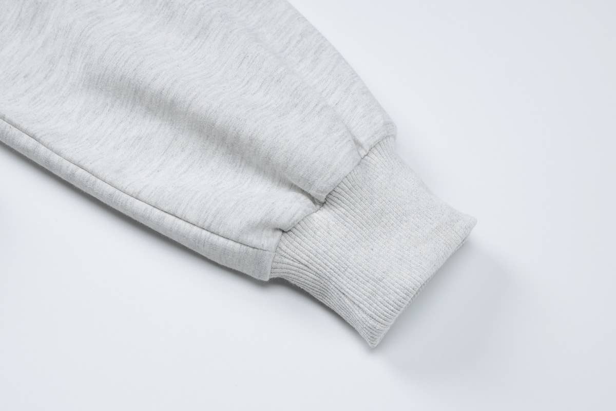 Long-sleeved sweatshirt and pleated skirt set