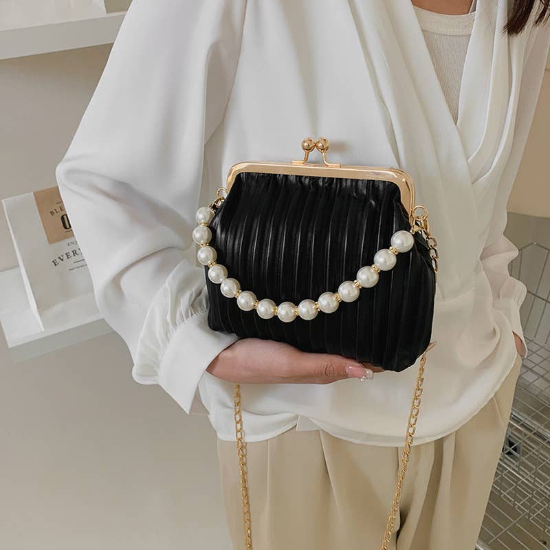 Pearl shell bag diagonally across the body