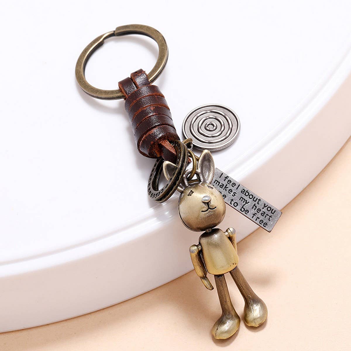 MOVABLE CARTOON ROBOT LEATHER KEYCHAIN