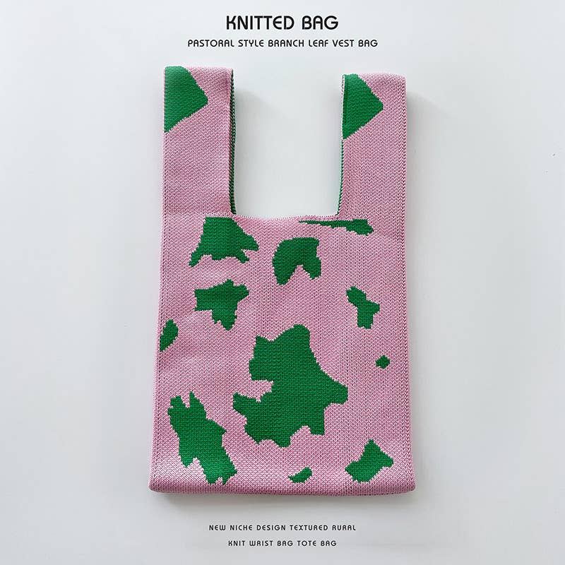 Heart-shaped color-blocked knitted handbag