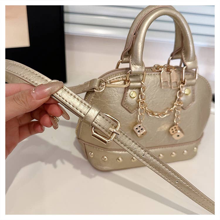 Fashionable riveted single-shoulder bag