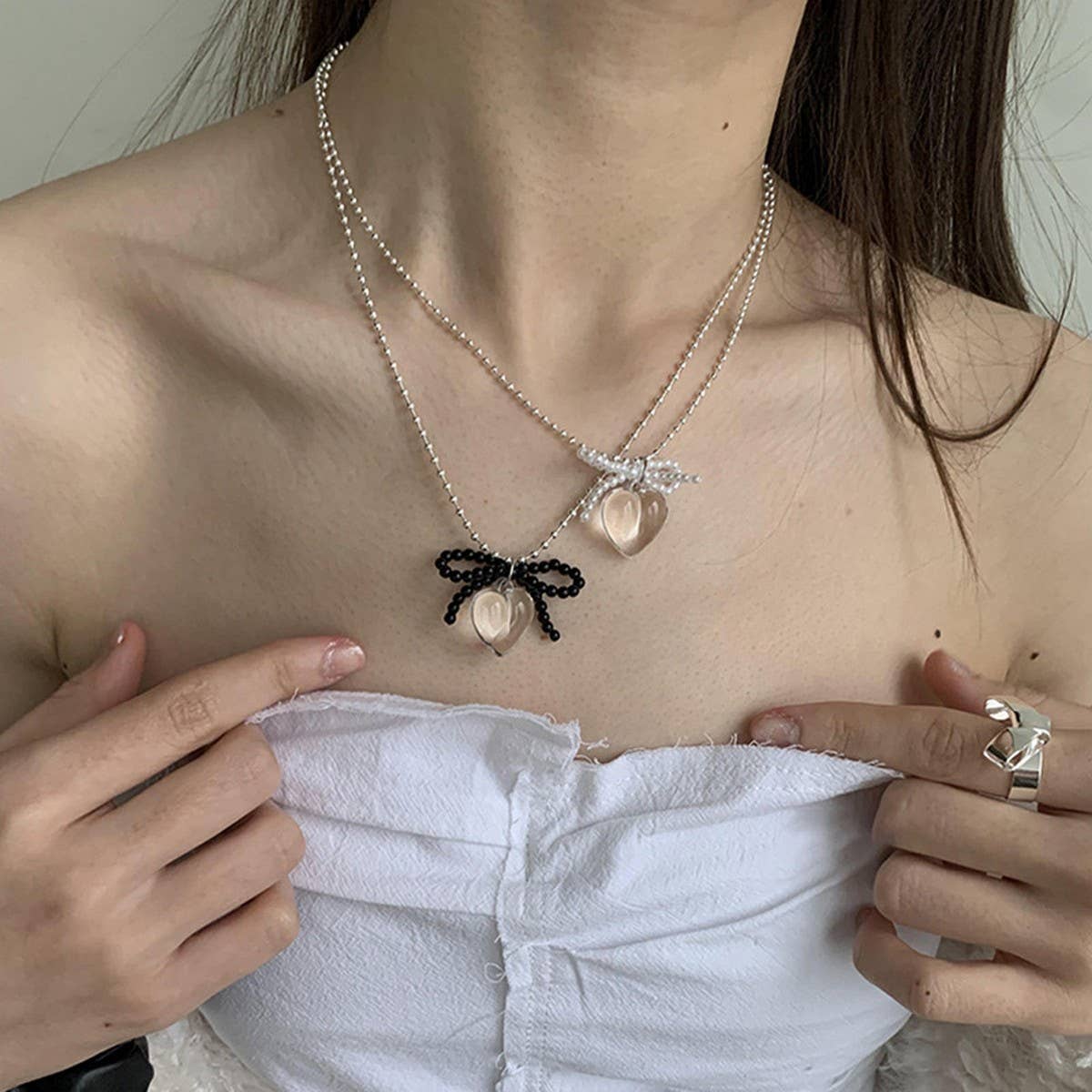 FASHION TRANSPARENT HEART PENDANT BOW NECKLACE_CWAJE3073