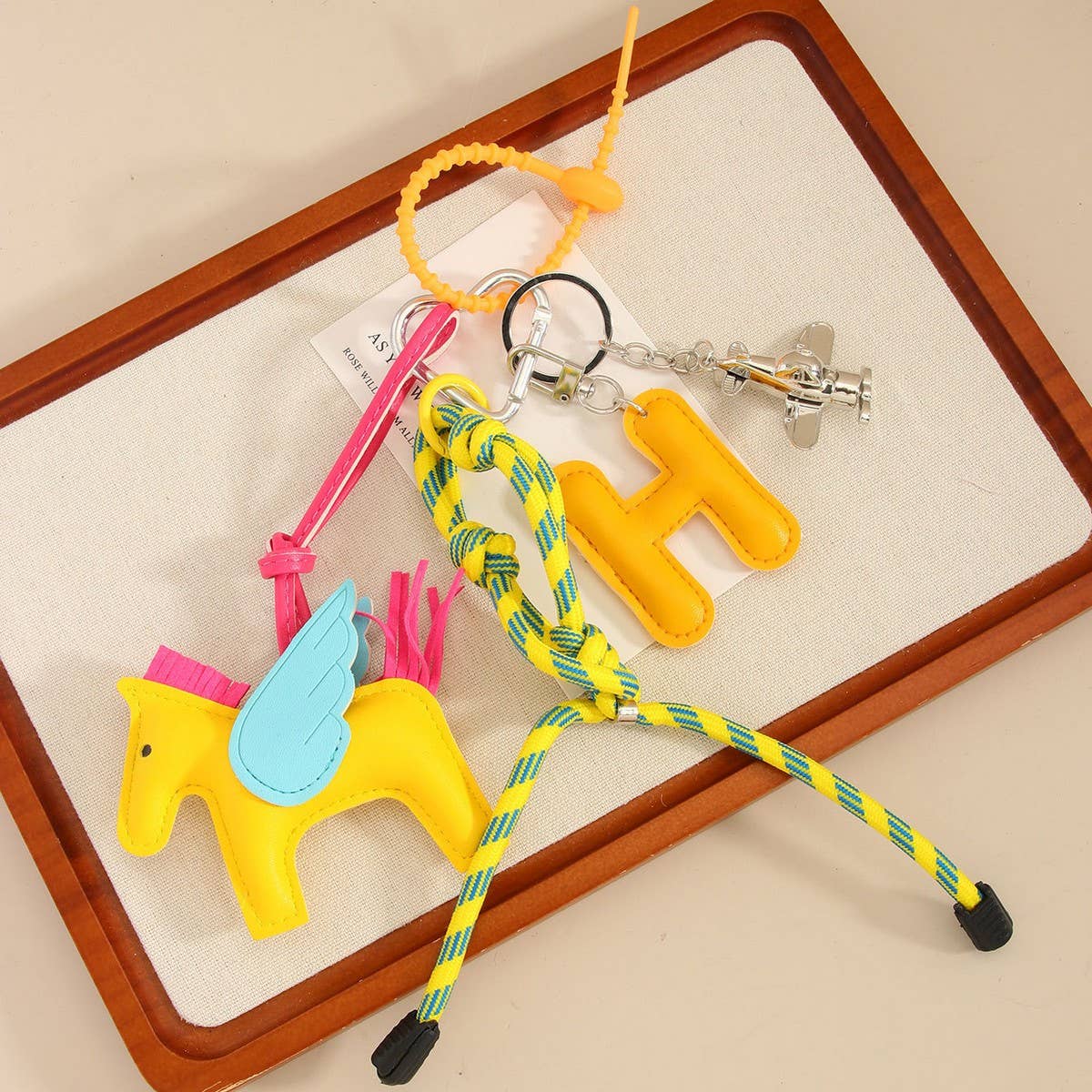 Leather Pegasus & Plane Letter Bag Charm_CWMM7566